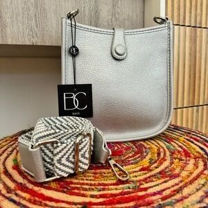 Silver cross-body purse with adjustable strap